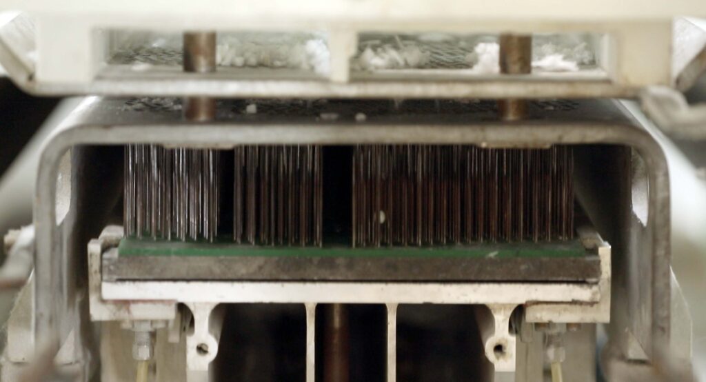 Needling process close-up PBM insulation manufacturing needle punching machine